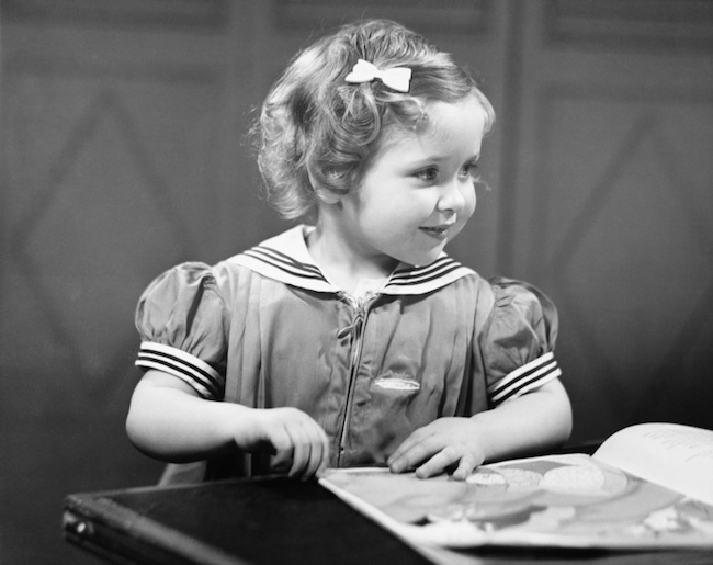 Image of Little Girl Reading a Story