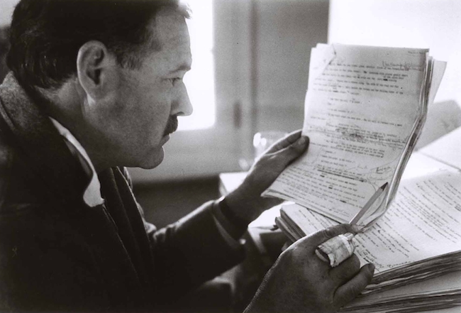 How to Grow an Audience that Grows Your Business Image of Hemingway Editing a Draft
